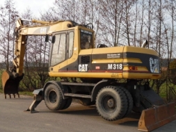 ขาย รถเเบคโคล้อยาง M318 CATERPILLAR