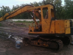 ขายรถแบ็คโฮ  คีบไม้